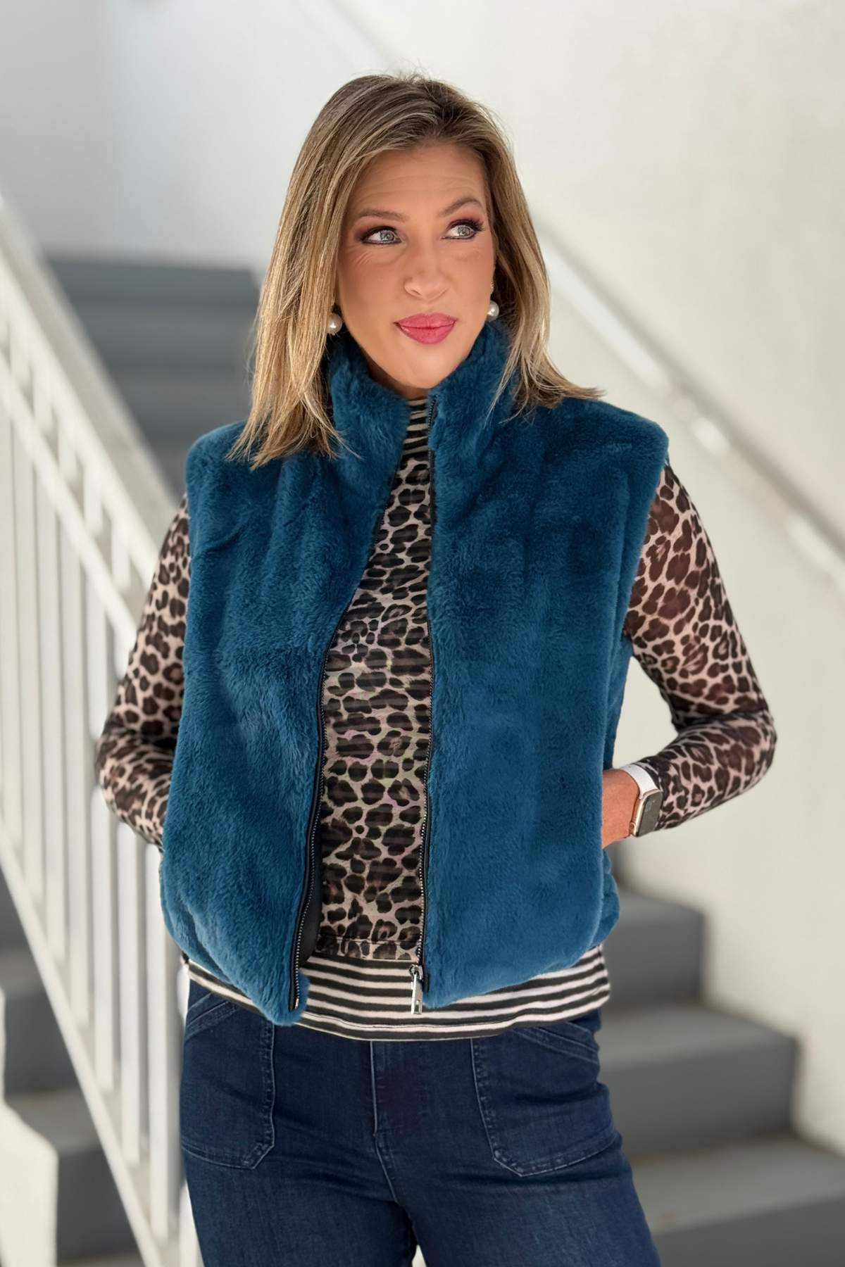 Renuar Deep Sea faux fur sleeveless vest styled with leopard top