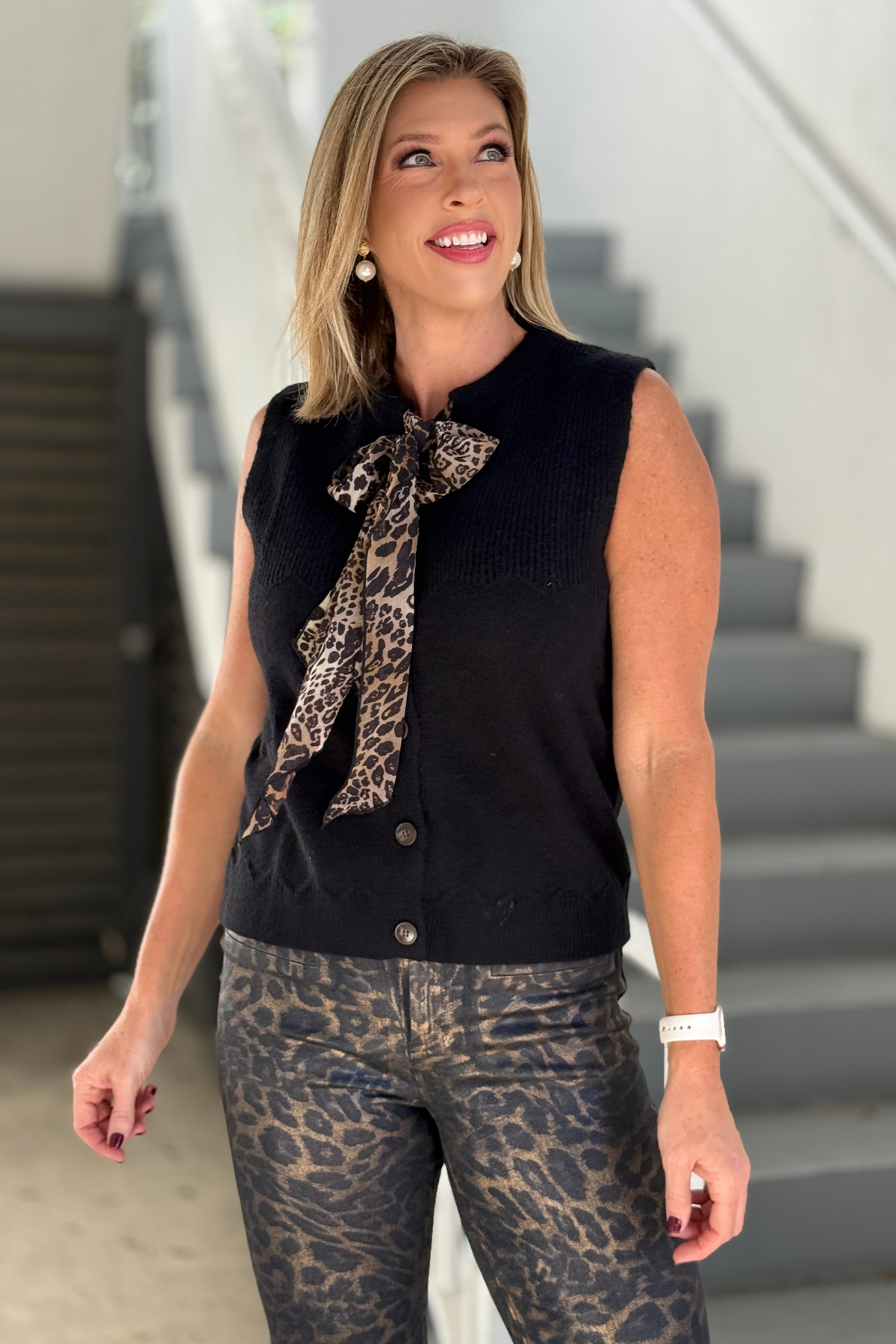 Black button front sweater vest for women