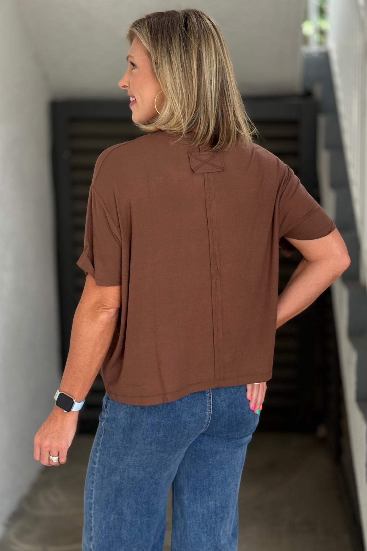 Back view of chocolate brown ribbed short sleeve tee