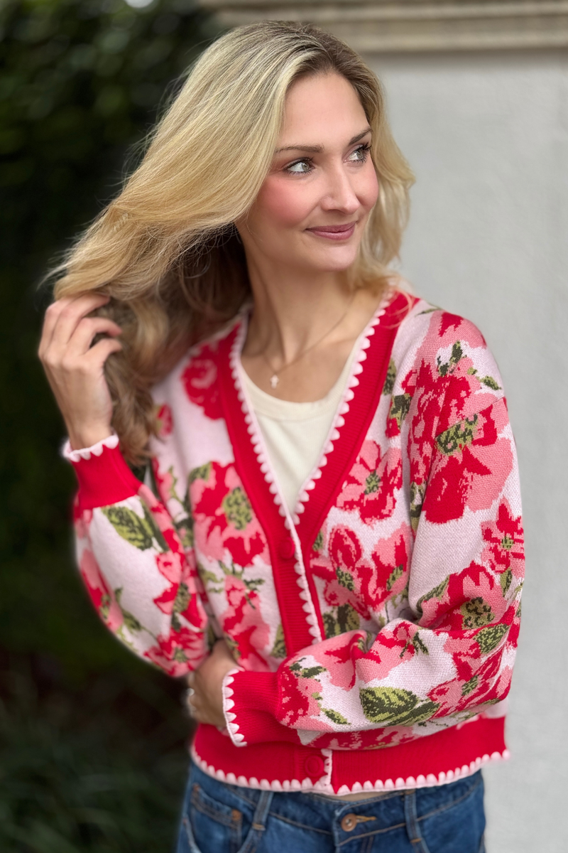 Women wearing floral knit cardigan with embroidered details