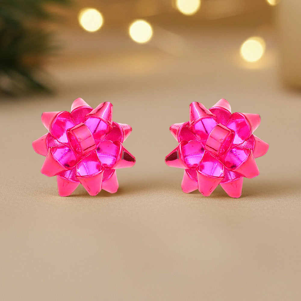 Hot pink Christmas gift bow stud earrings on white background