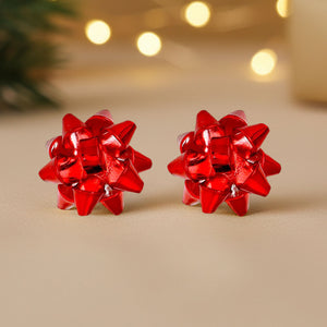 Red Christmas gift bow stud earrings on white background