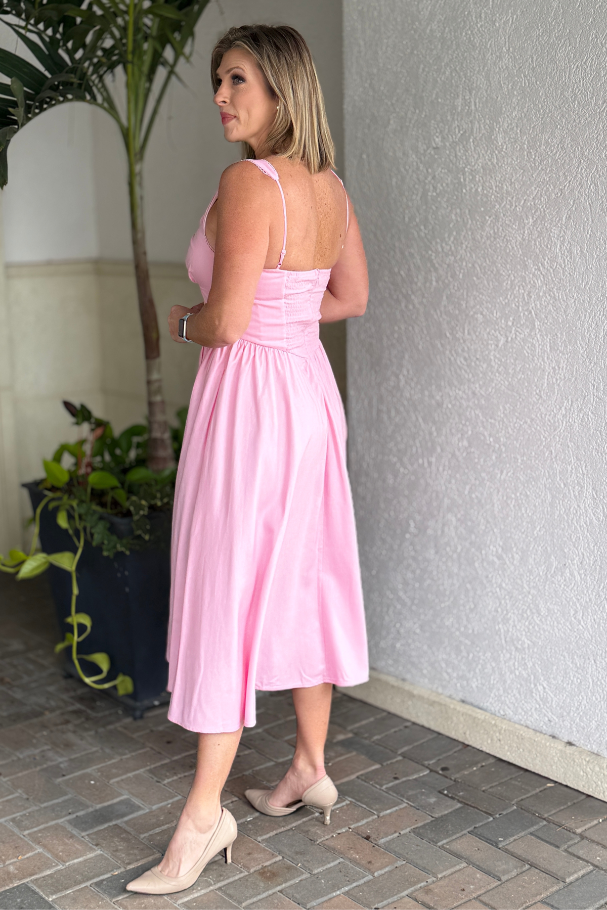 Back view of pink square neckline midi dress
