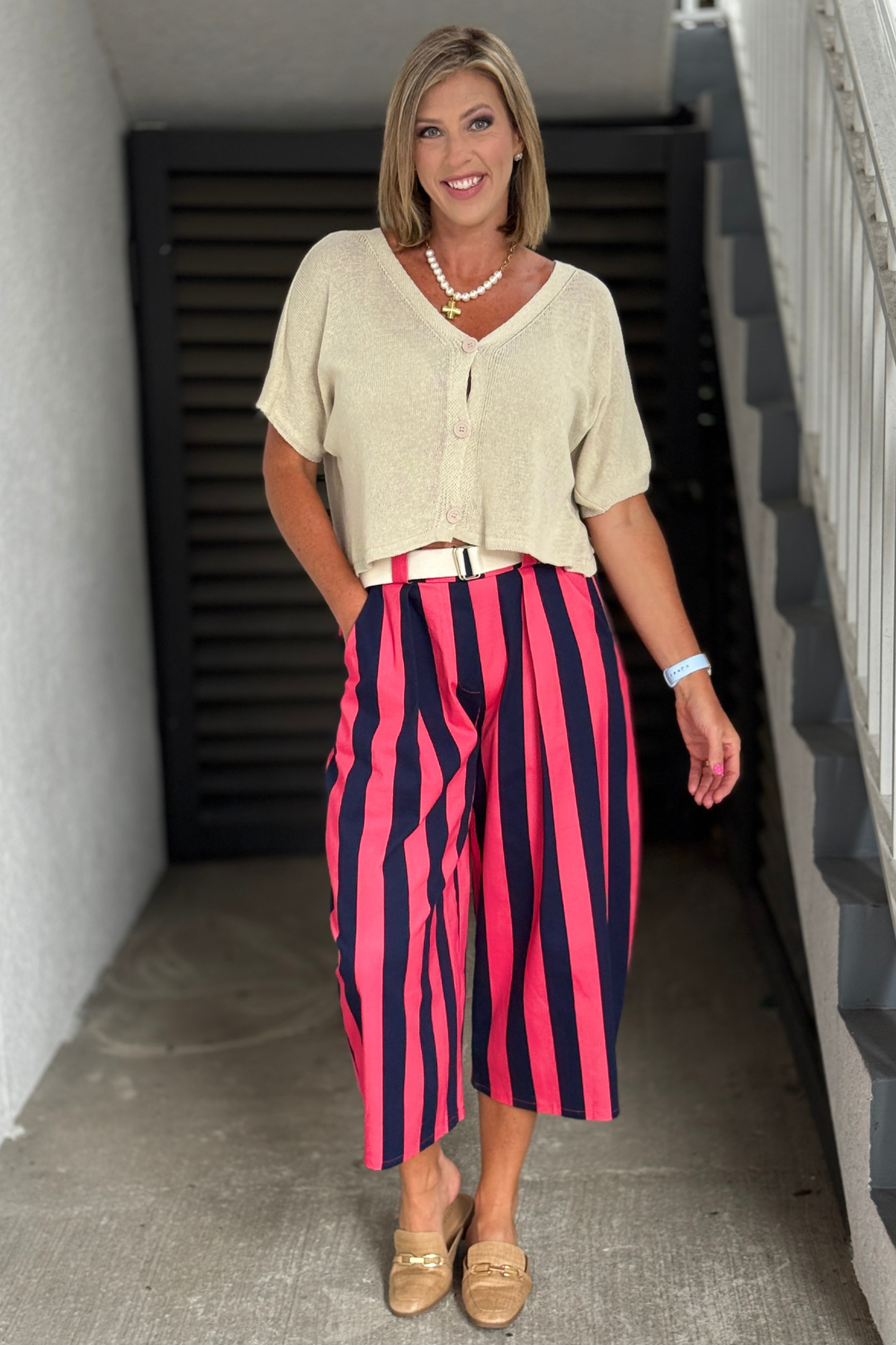 Side view of Made in Italy striped barrel pants