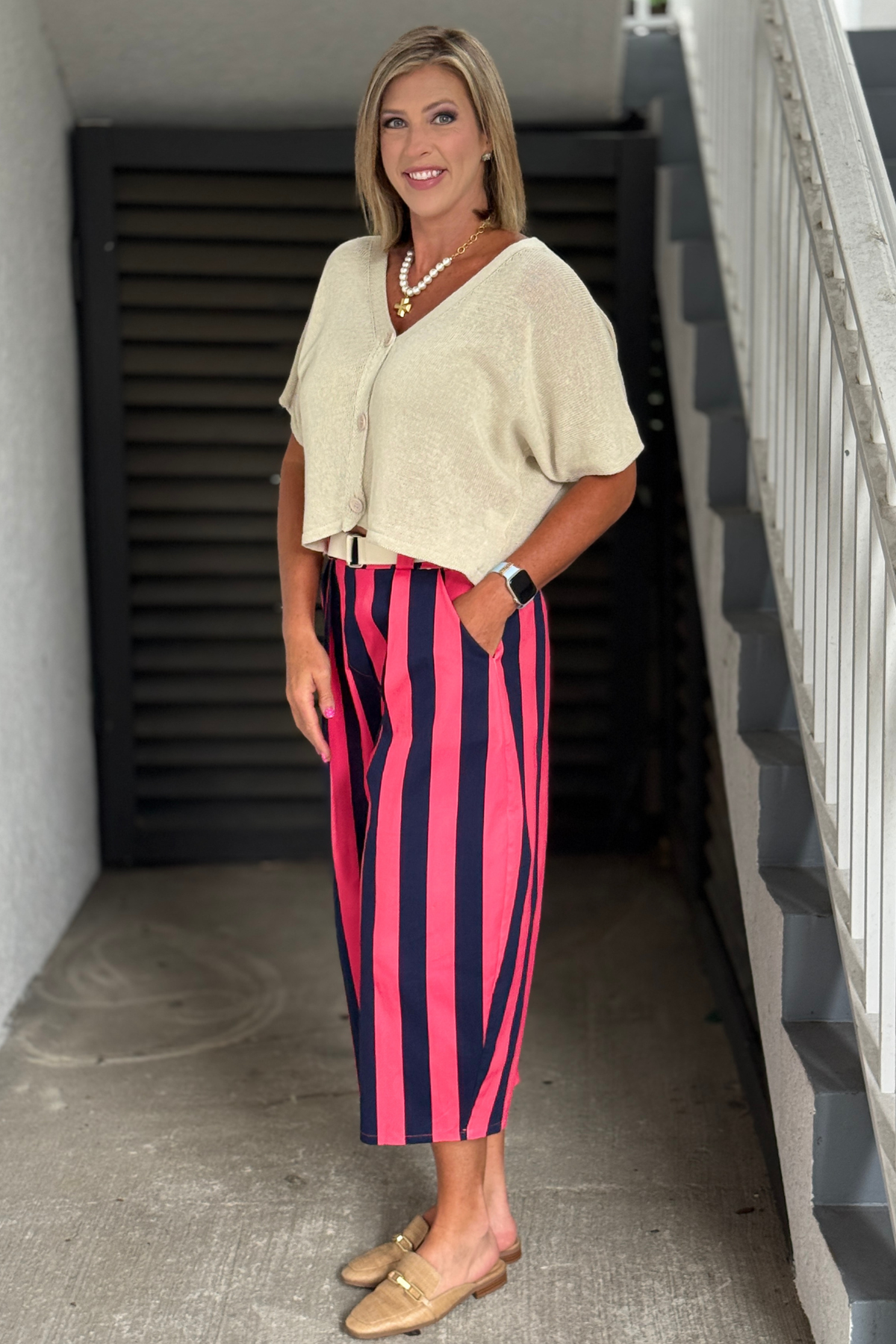 Back view of pink and navy stripe pants