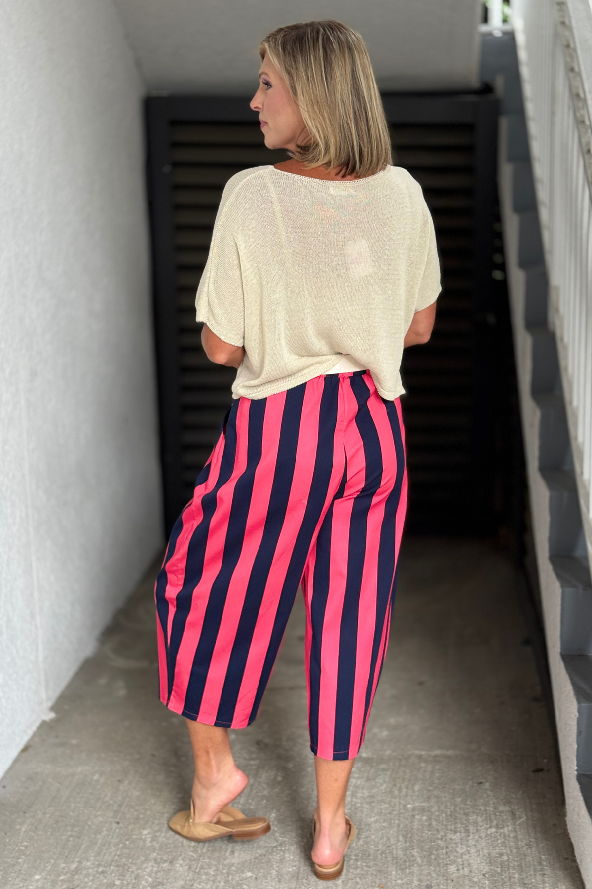 Women's cropped striped barrel pants styled for summer
