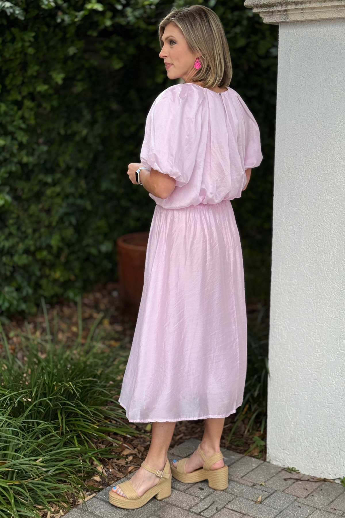 Back view of pink silk skirt with elastic waistband