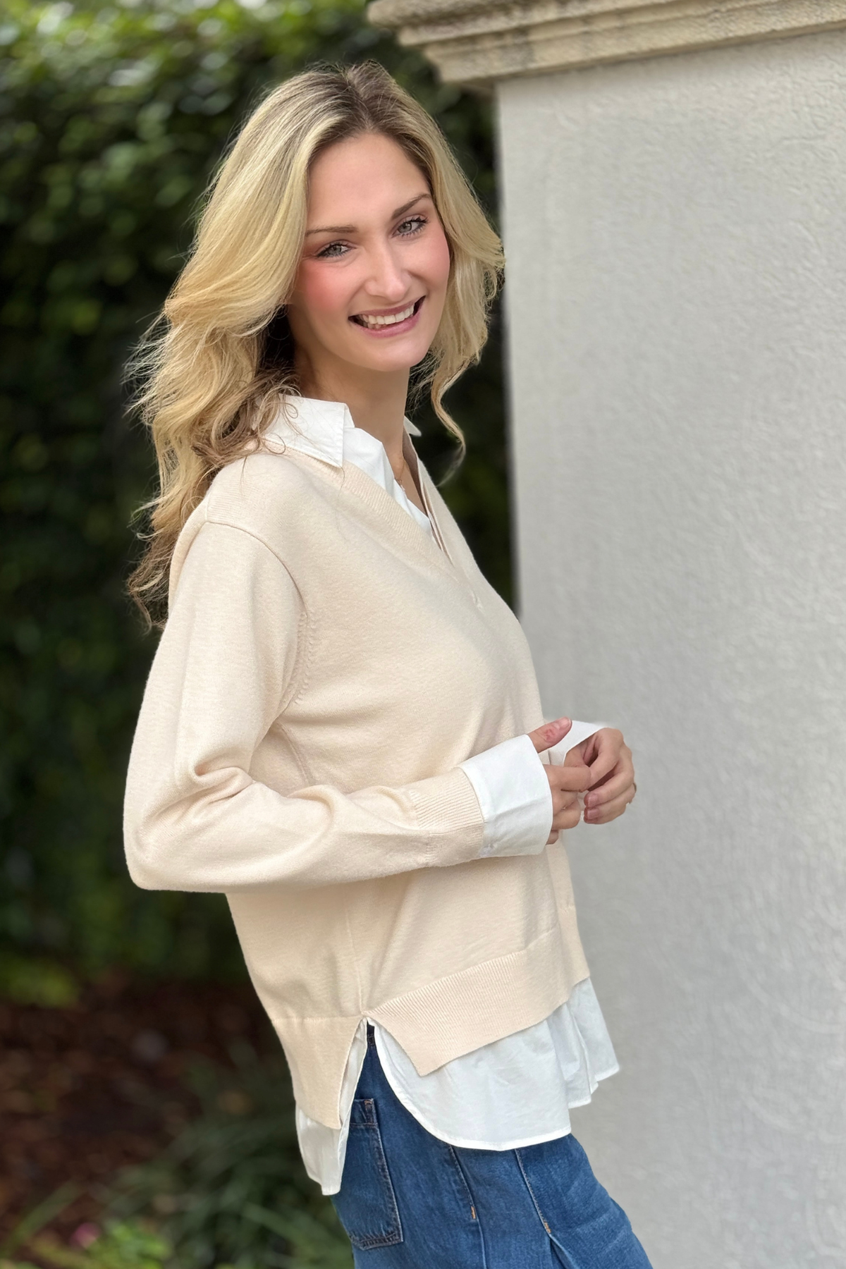 Back view of white mixed media layered sweater for women