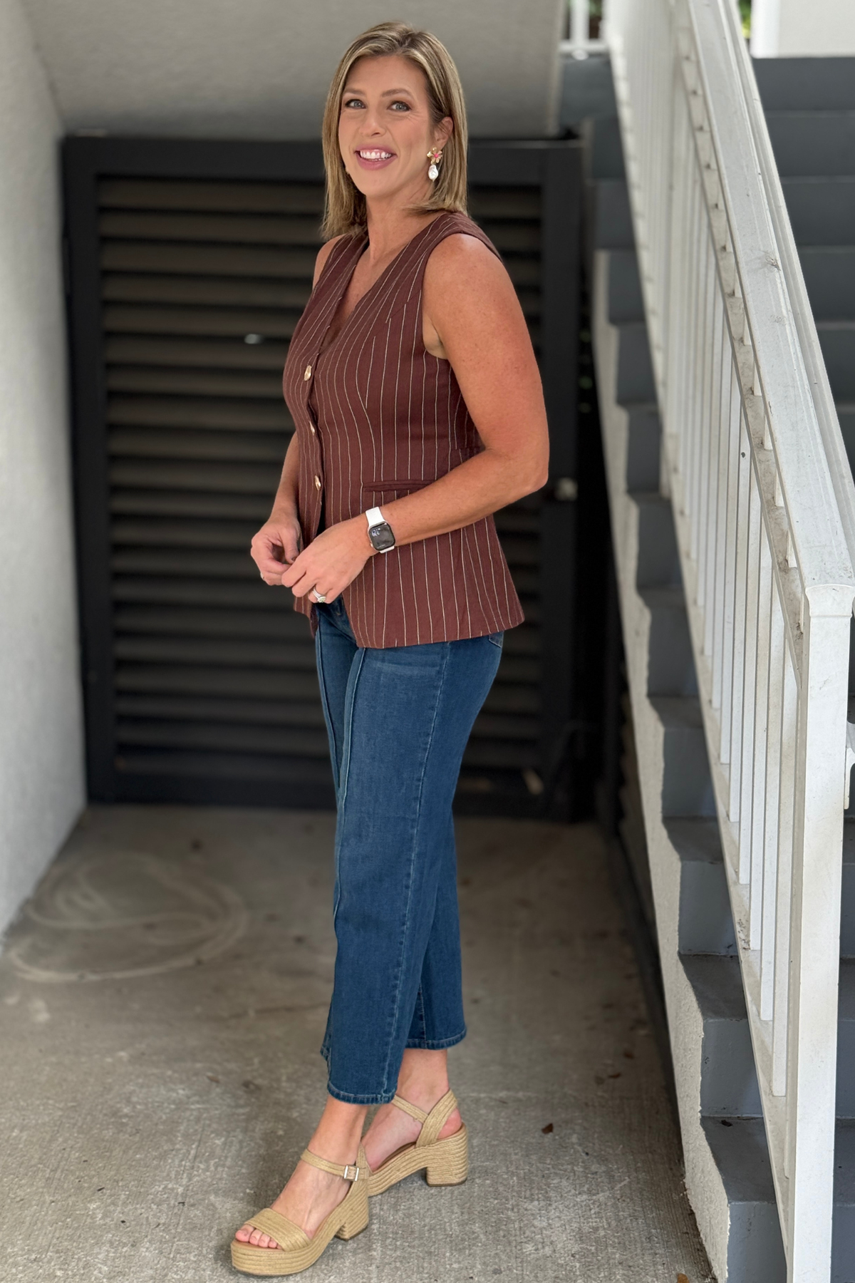 Women’s brown and ivory pinstripe sleeveless vest with gold buttons