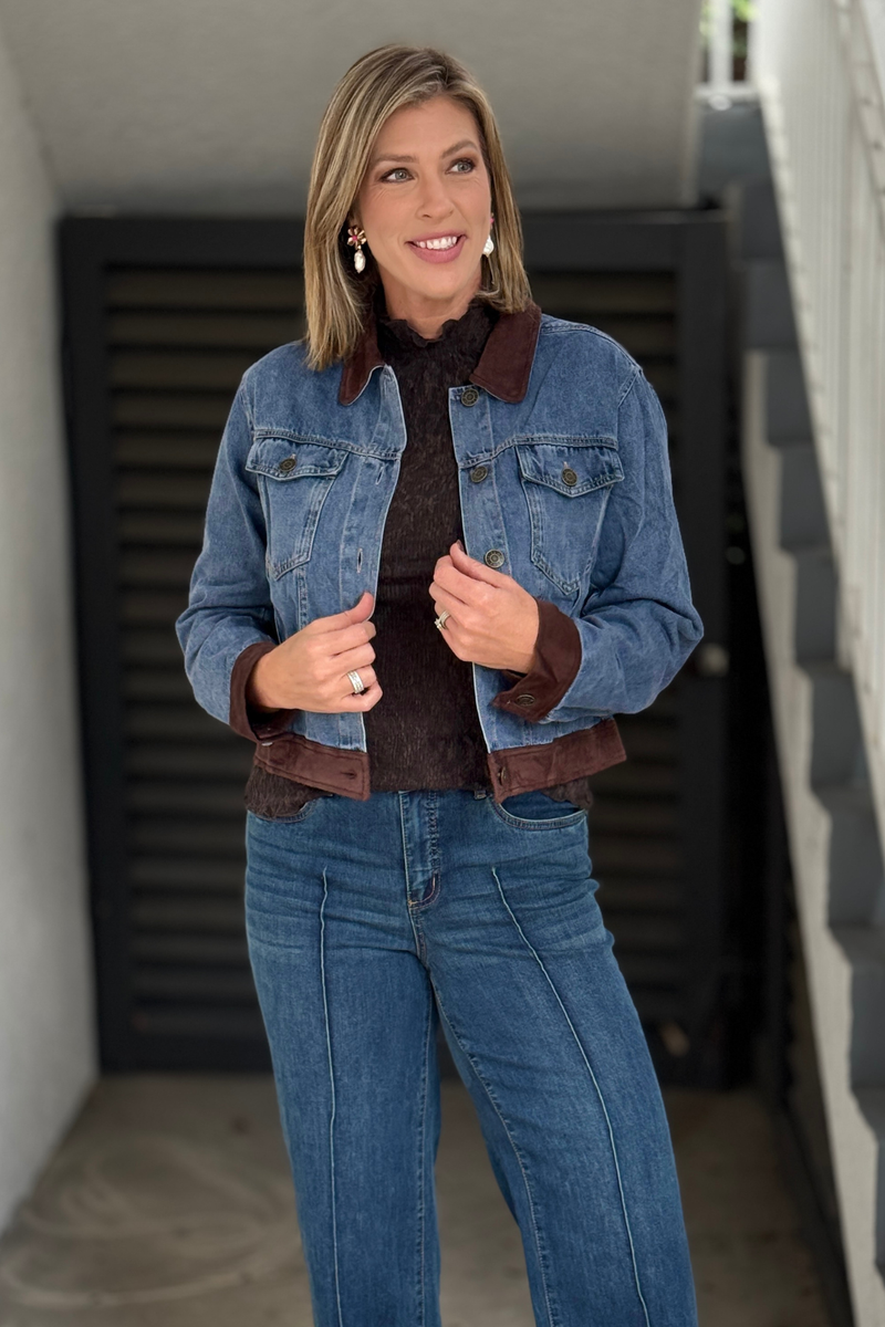 Women’s medium wash denim jacket with brown faux suede collar
