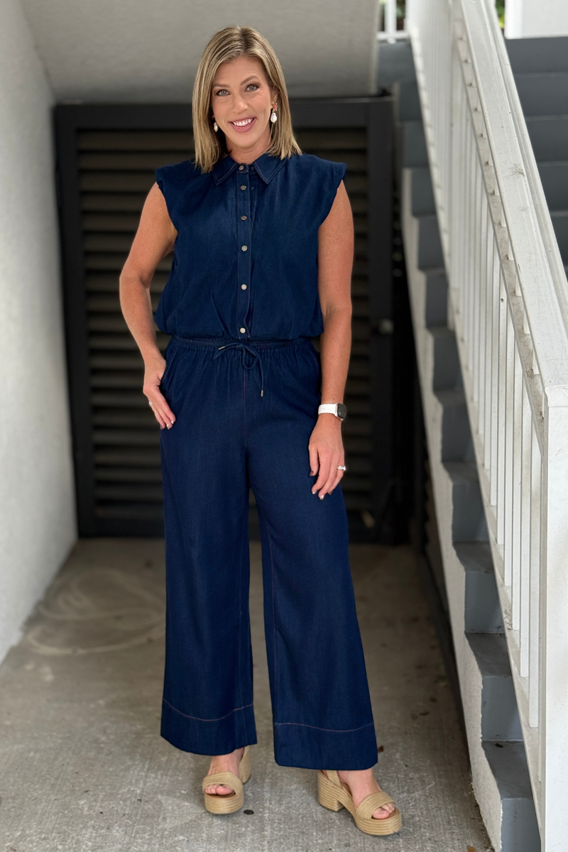 Dark indigo denim pants with elastic waistband and drawstring