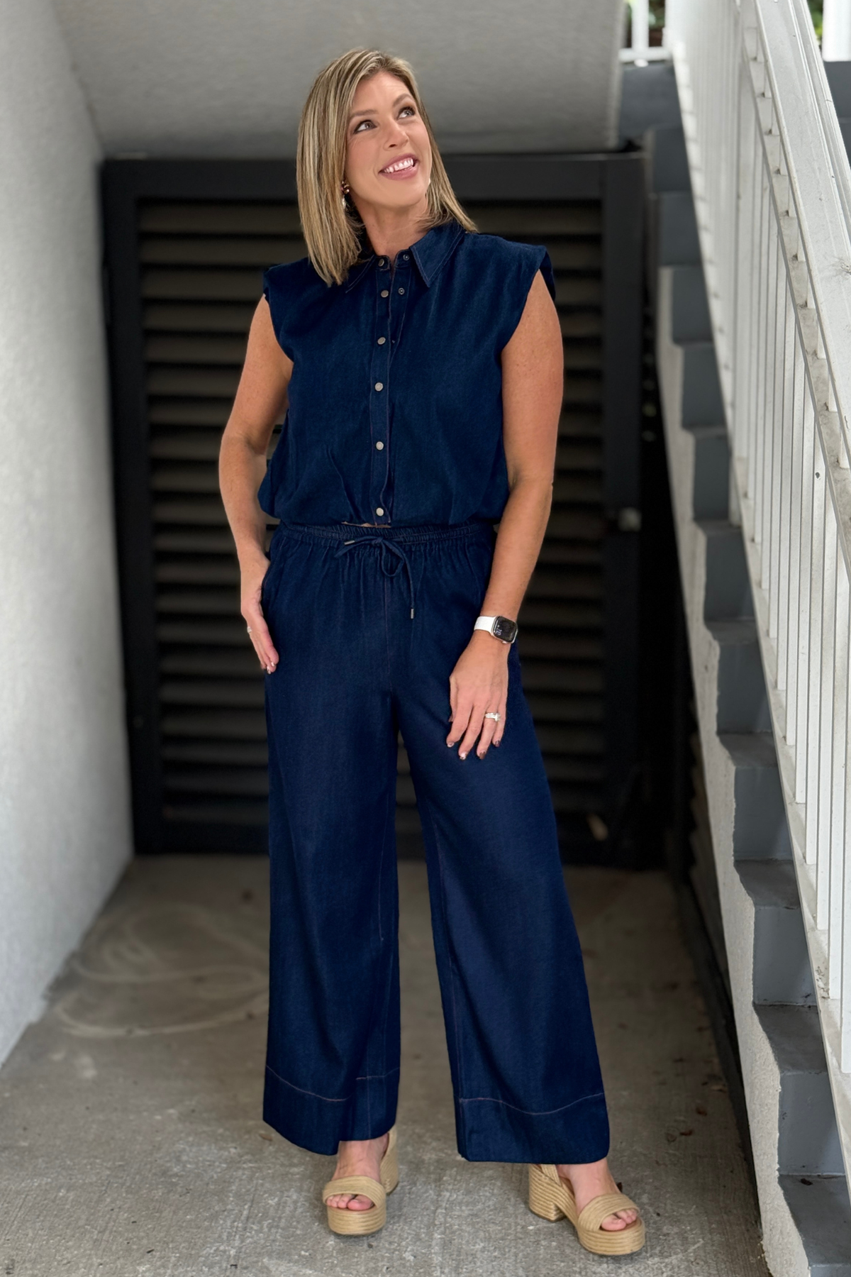 Relaxed pull-on denim pants styled with matching denim top