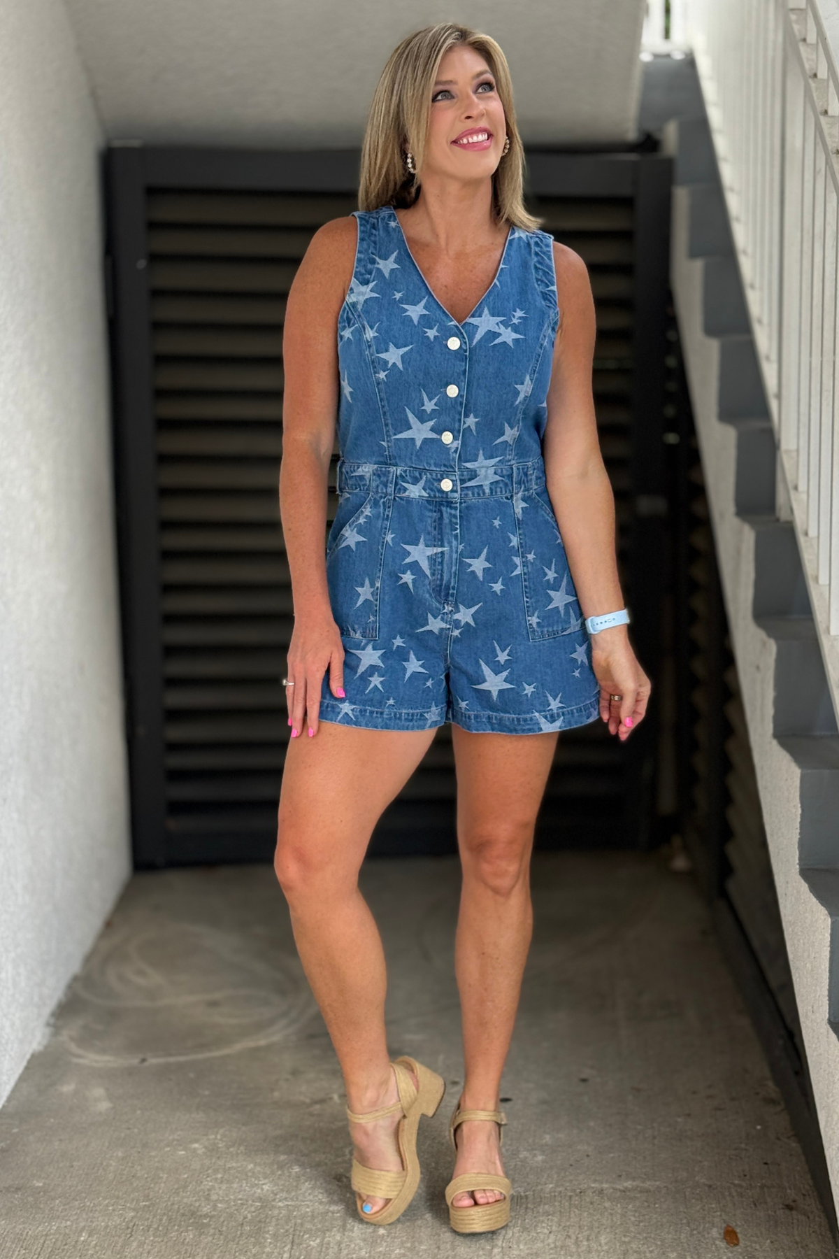 Women’s washed denim romper with white star print