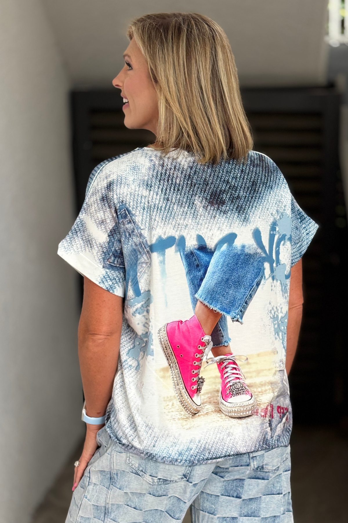 Back view of lightweight graphic knit top