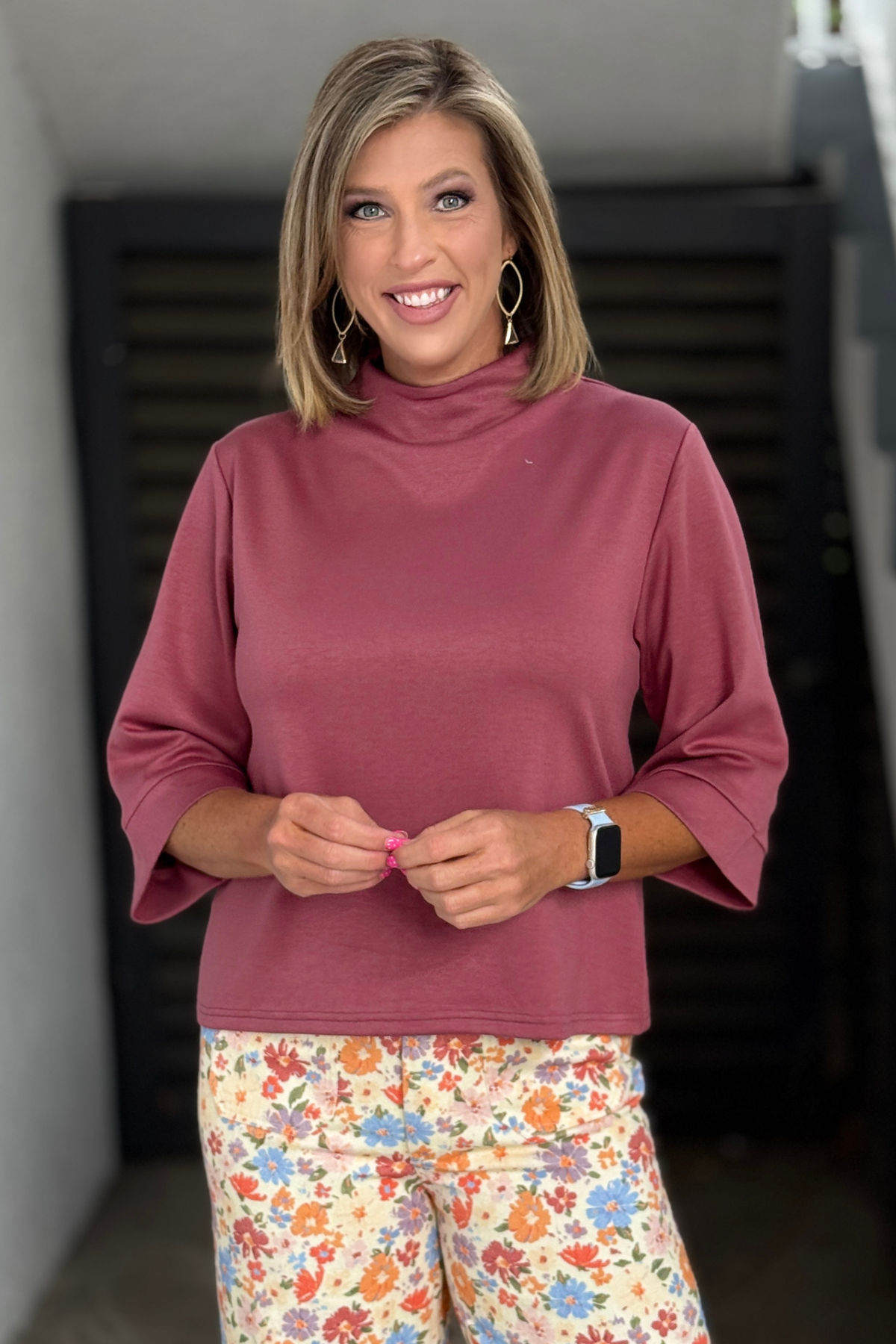 Relaxed fit mock neck boutique top