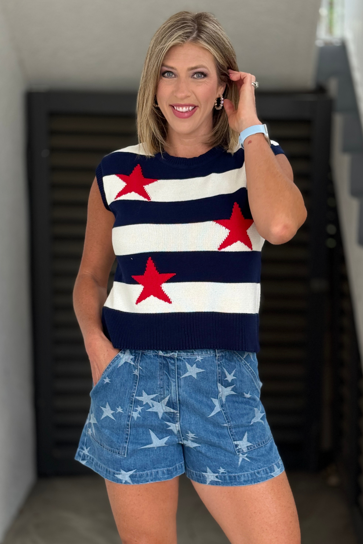 Patriotic striped sweater vest with red stars
