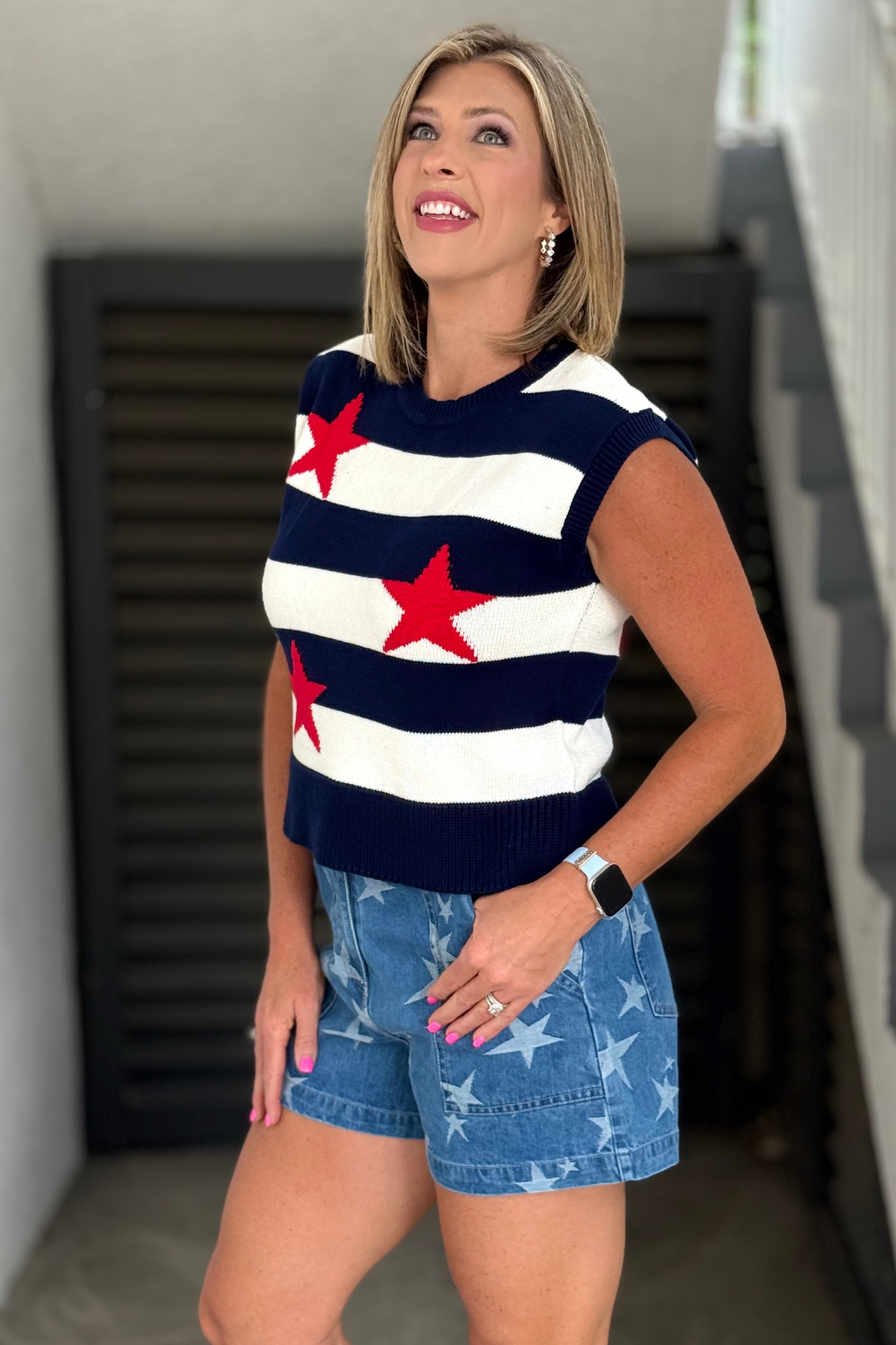 Women’s Americana knit vest paired with star denim shorts