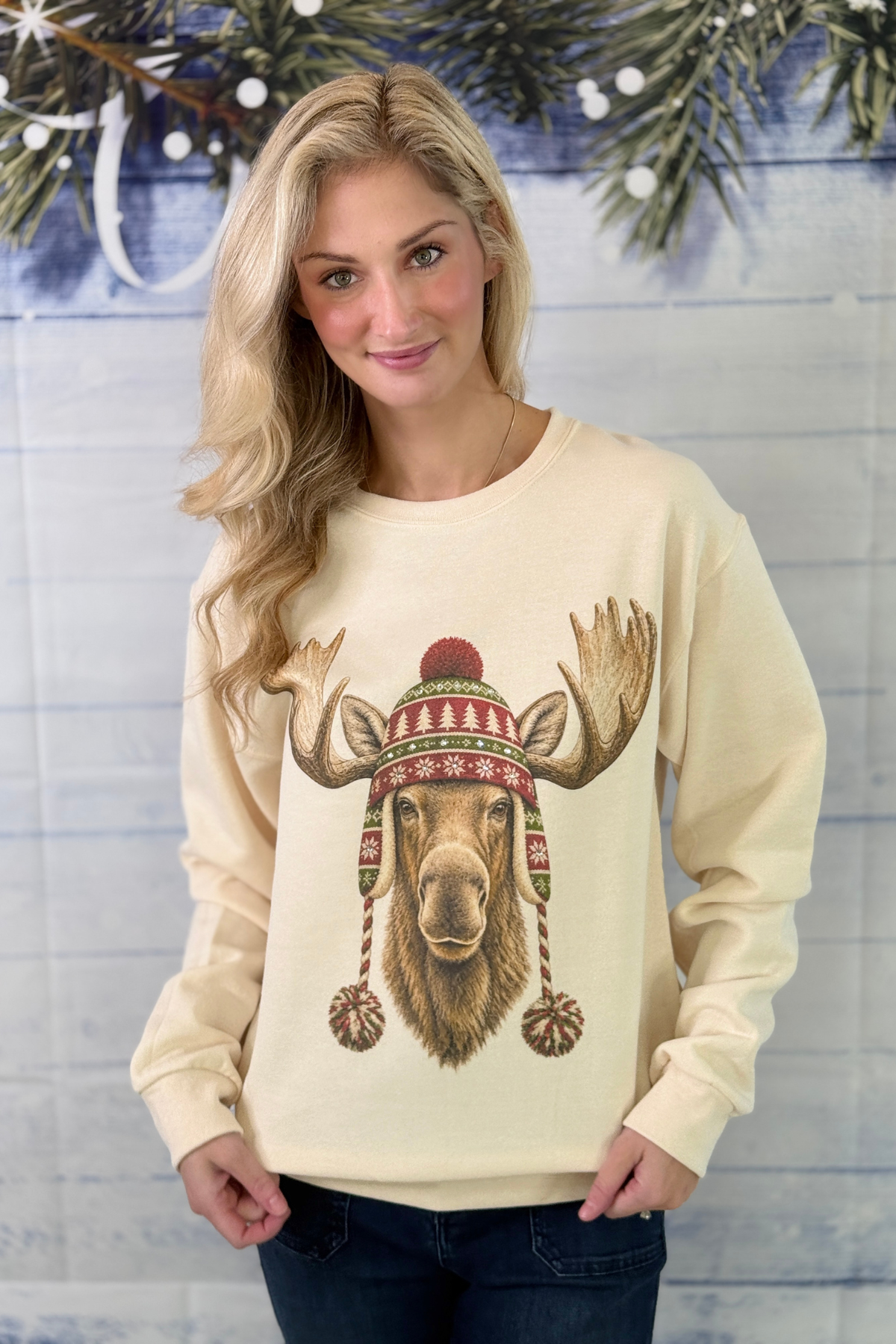 Merry Moose Christmas sweatshirt in cream front view  