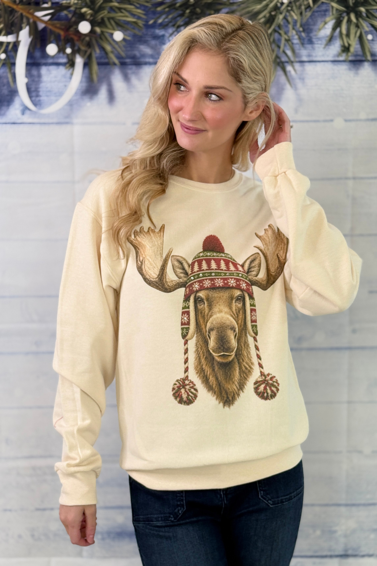 Women's cream moose Christmas graphic sweatshirt with winter hat  