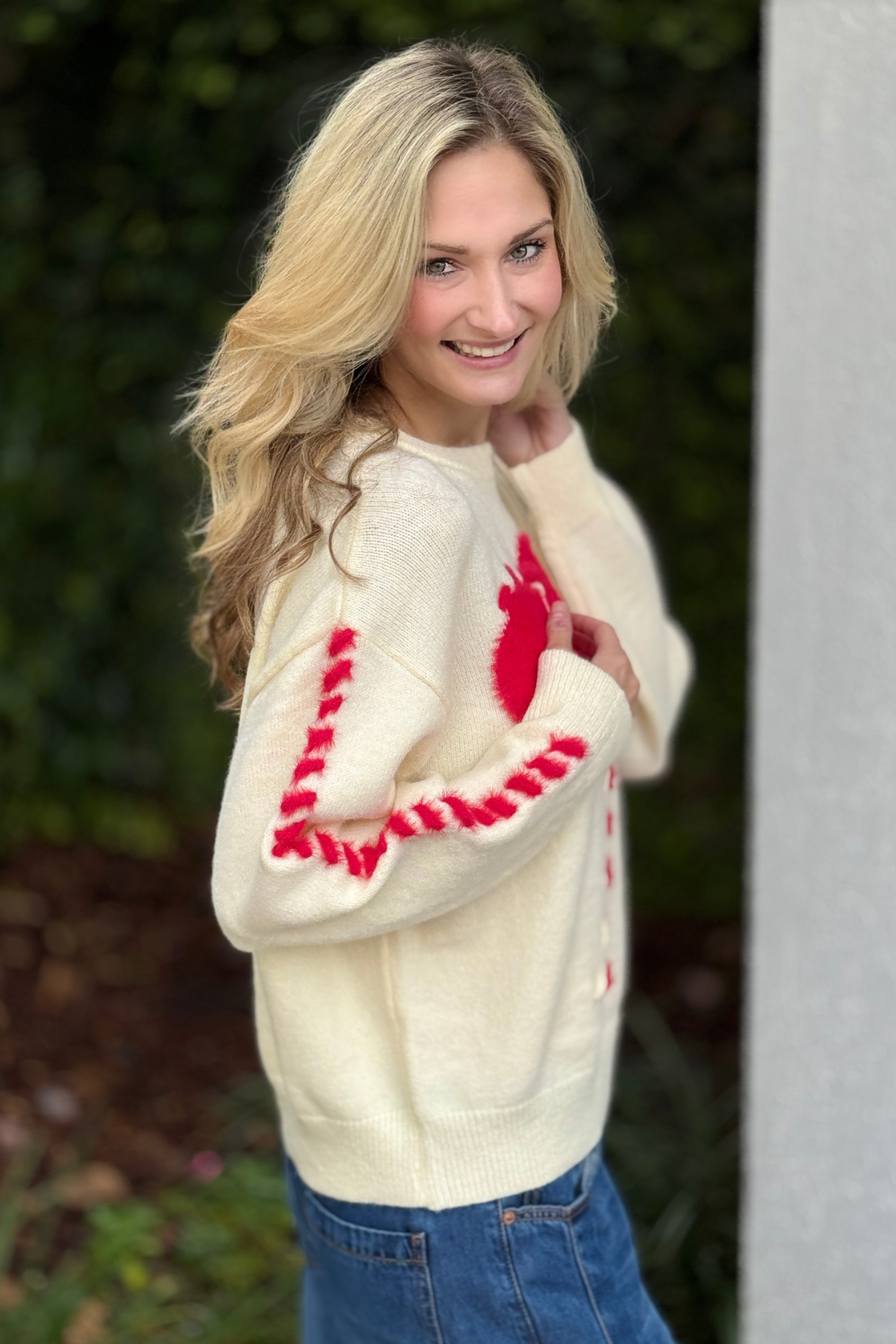 Casual boutique heart sweater with relaxed fit and ribbed hem