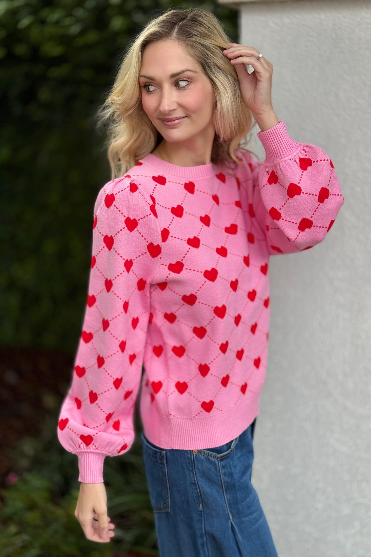Women’s pink heart sweater with ribbed trim