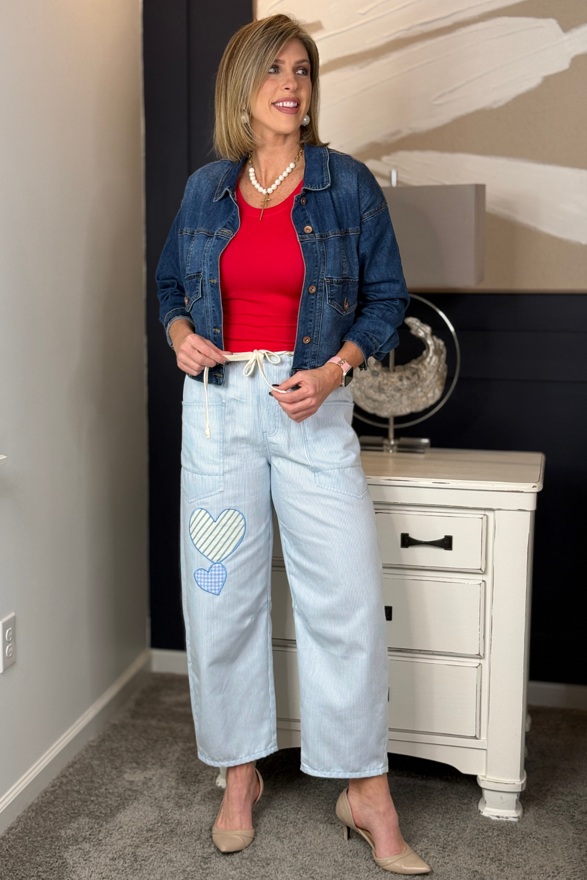 Washed baby blue pants with contrast heart patches