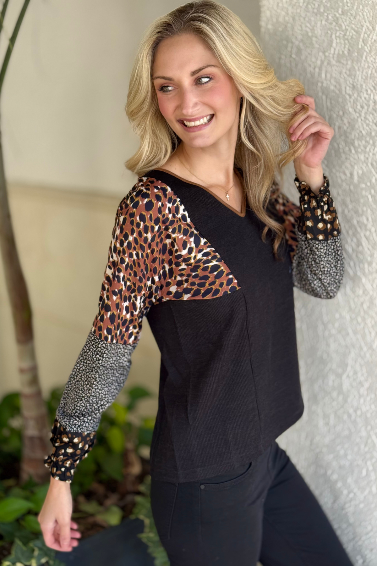 THML black top with statement animal print sleeves