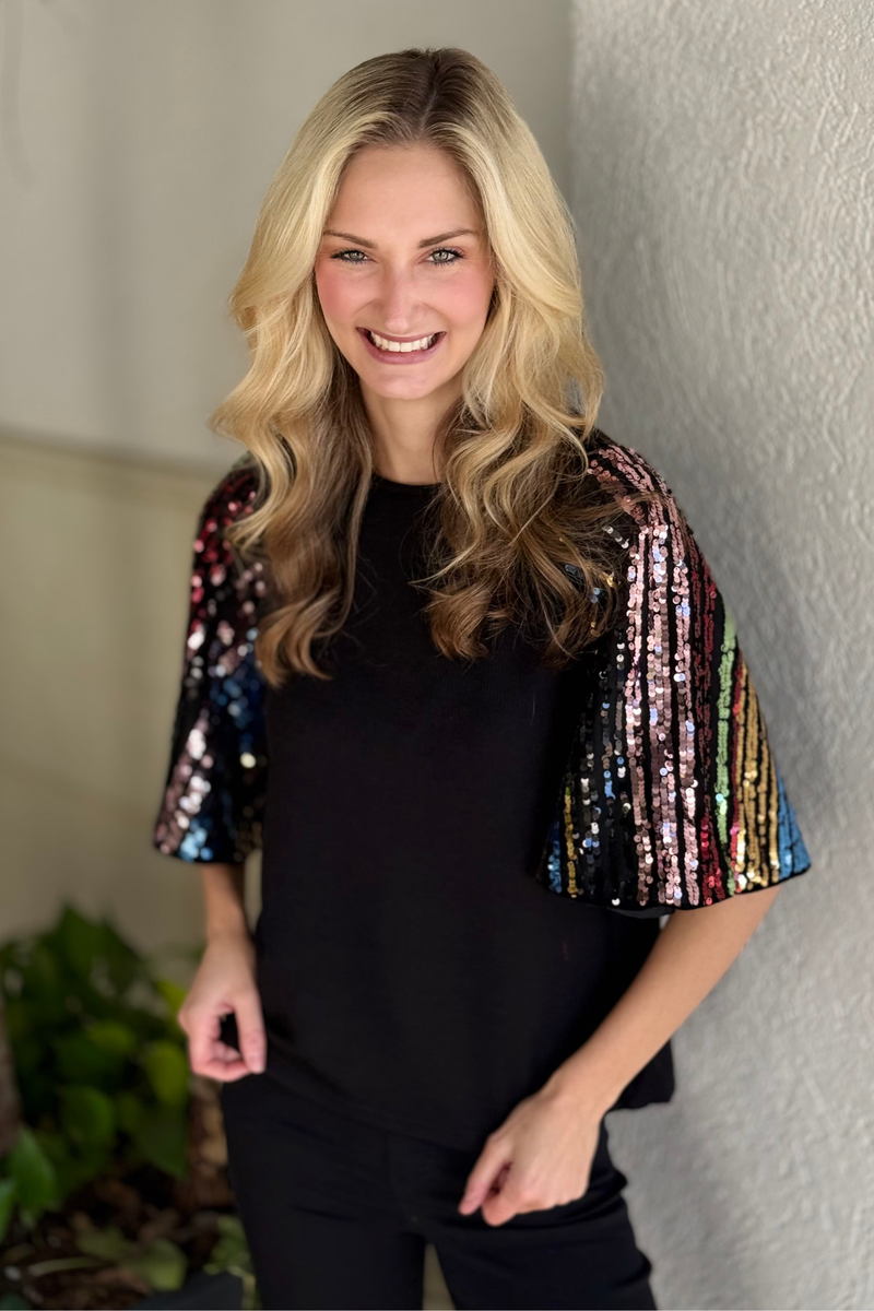 Black THML top with shimmer bell sleeves