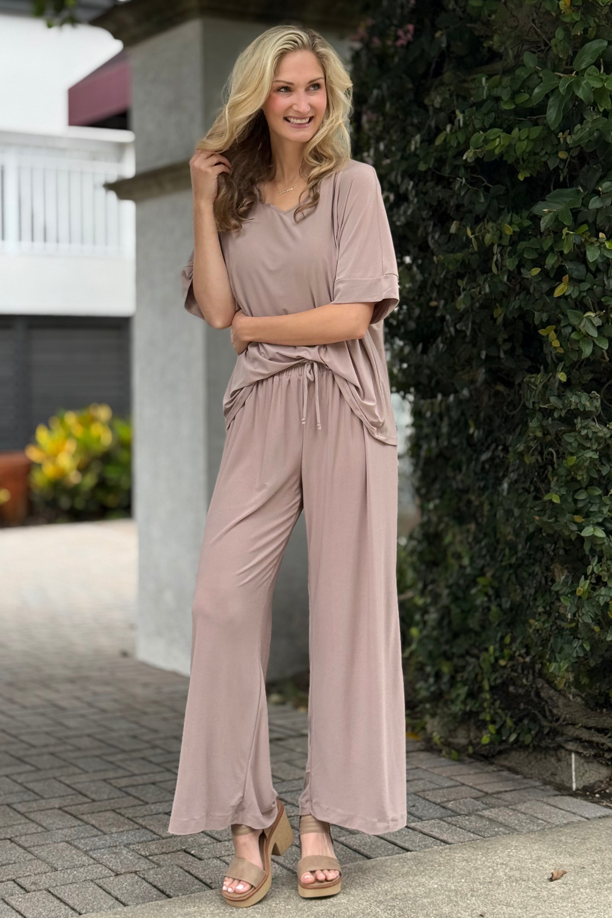 Woman wearing The Cabana Lounge Set in mocha from the TPN Collection