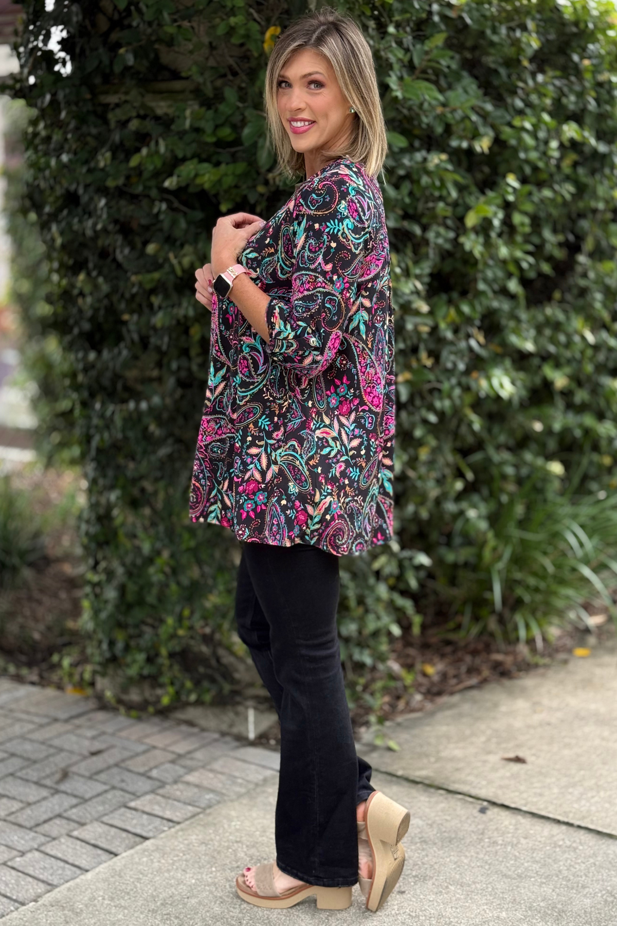 Model wearing TPN Everyday Essential Cardigan featuring wrinkle-free travel fabric and open-front relaxed fit, perfect for layering.