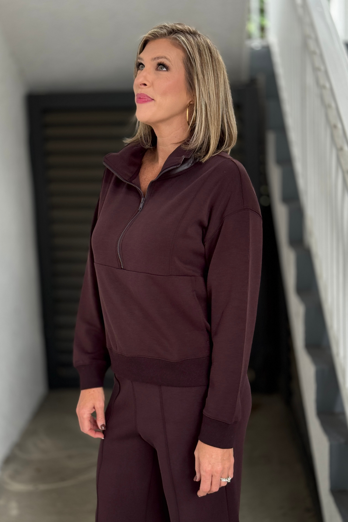Saddlebrown half zip top with quilted collar detail
