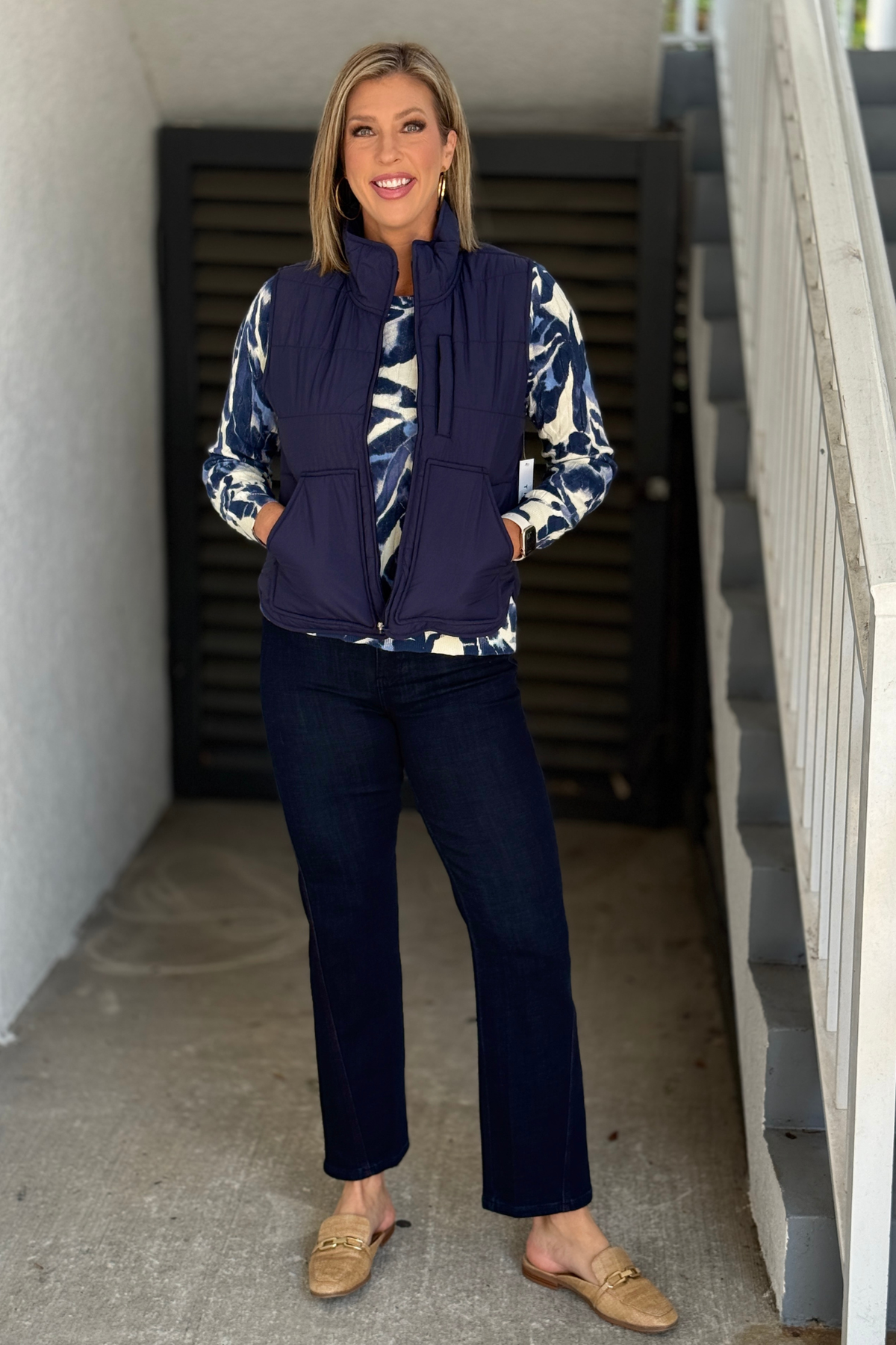 Women’s Tribal navy quilted puffer vest styled with printed sweater