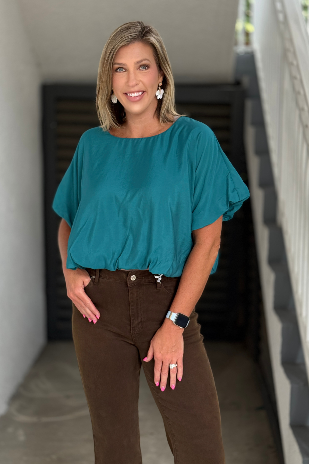 Lightweight teal bubble hem top with short sleeves