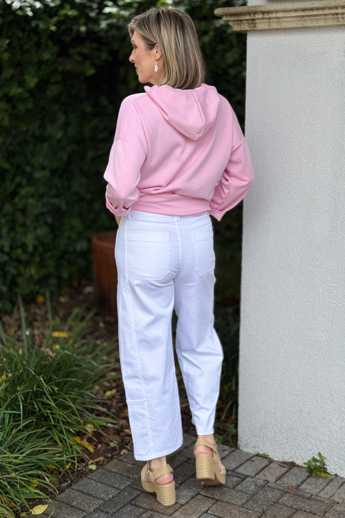 Back and side angle of barrel silhouette white jeans