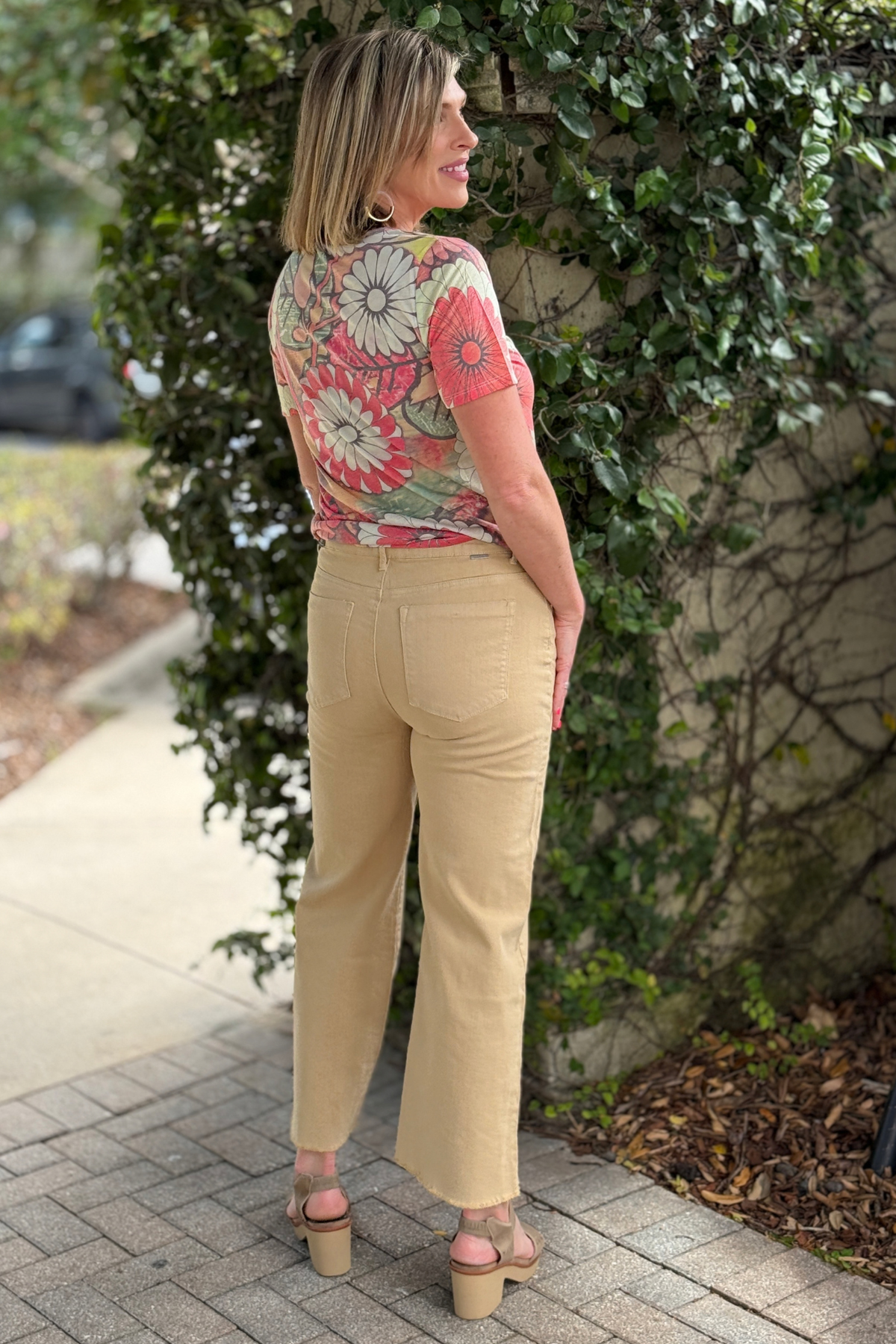 Boutique neutral jeans styled with floral tee