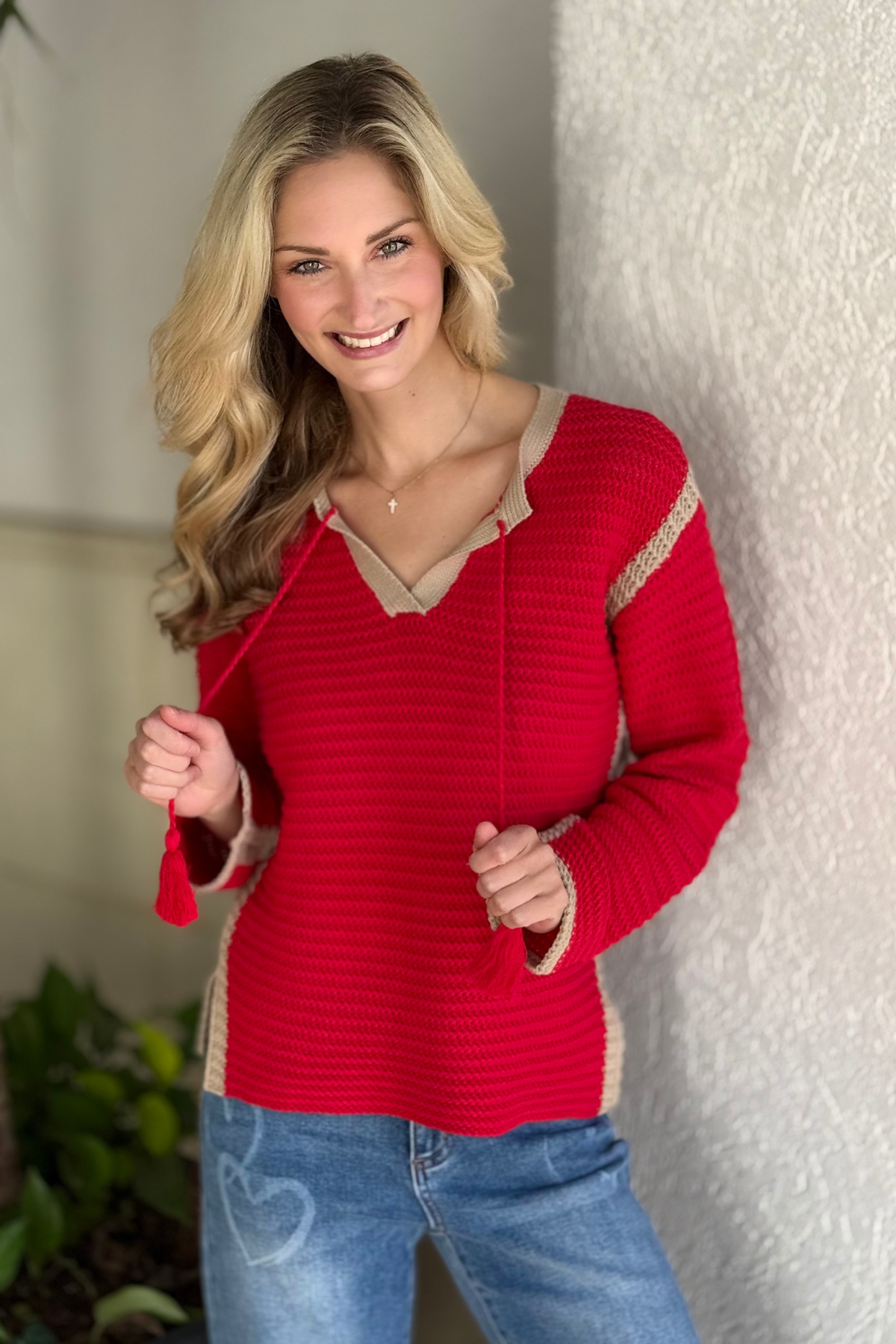 Woman wearing Tribal Sangria notch collar tassel sweater