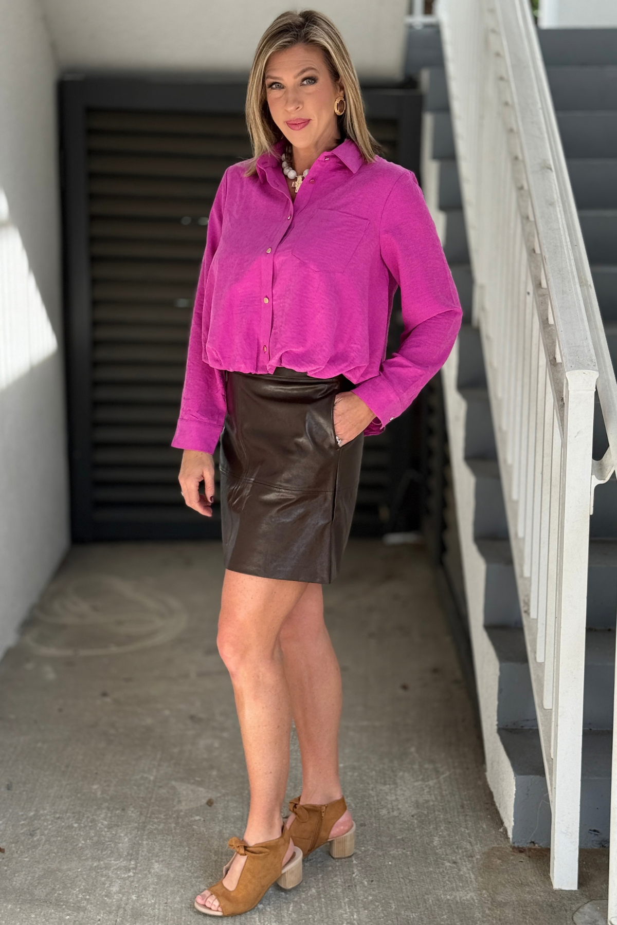 Tribal brown faux leather skirt styled with orchid button-down top  