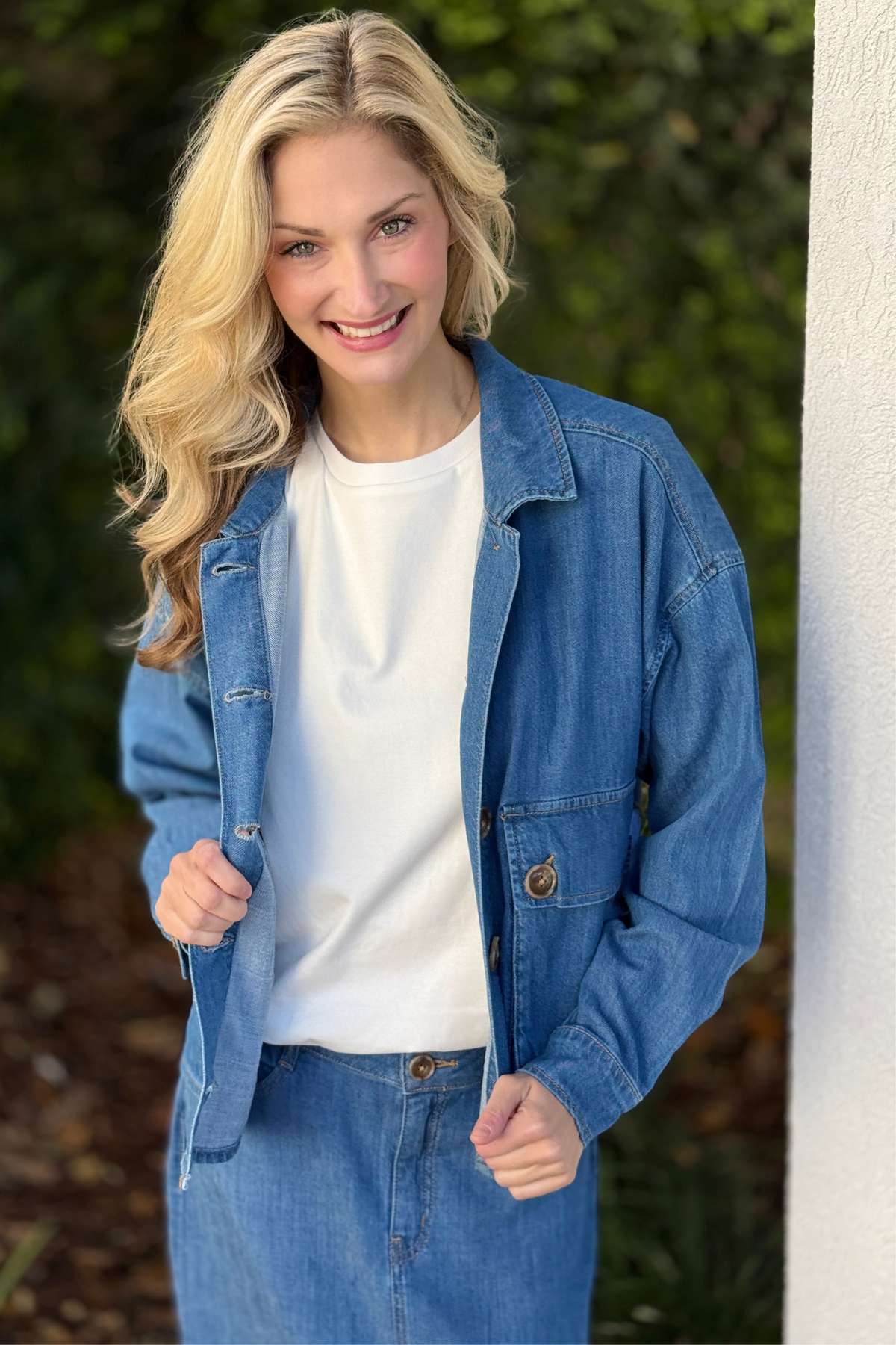 Woman wearing Tribal Fjord Blue button front denim jacket with patch pockets