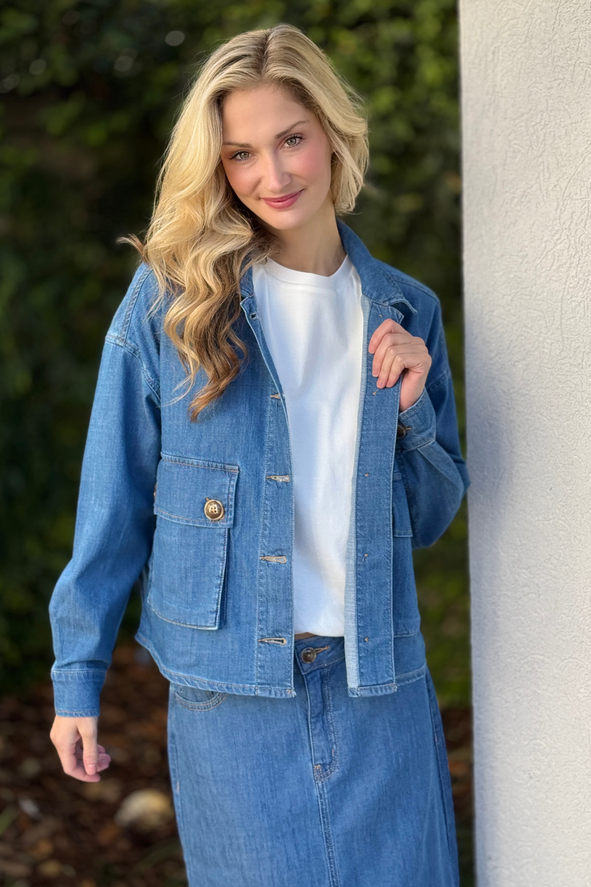 Front close up of Tribal Fjord Blue denim jacket button and pocket details