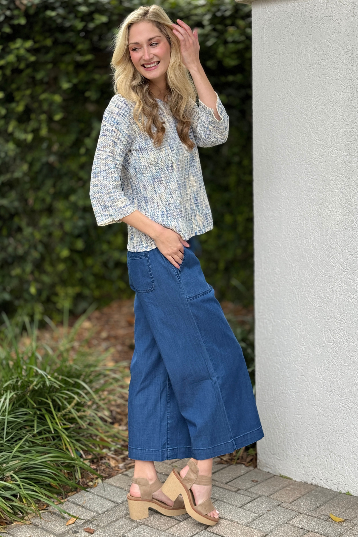 Lightweight denim wide crop pants styled with knit top