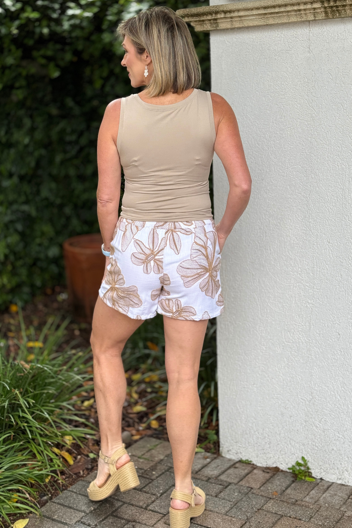 Close-up of crosshatch embroidery detail on summer shorts