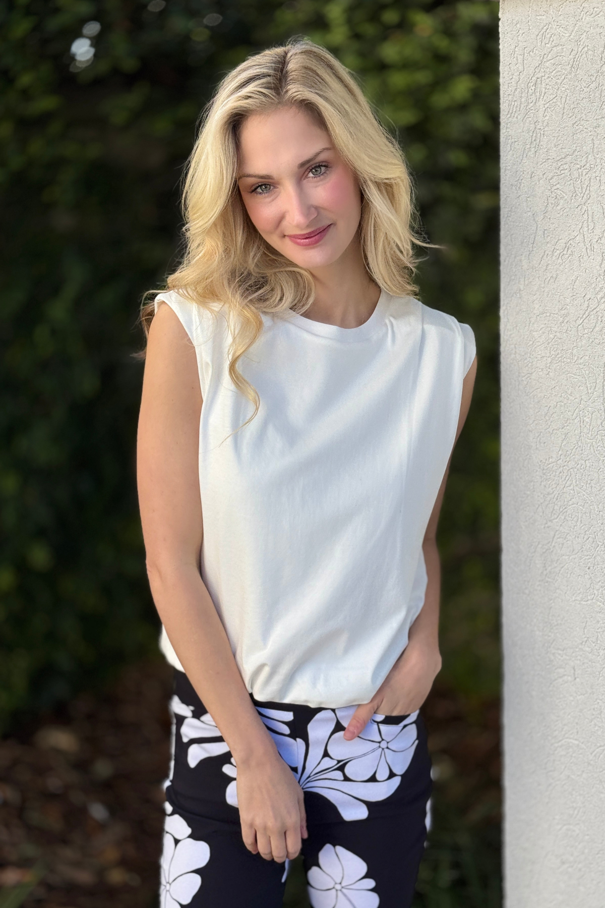 Close view of Tribal white sleeveless structured shoulder top