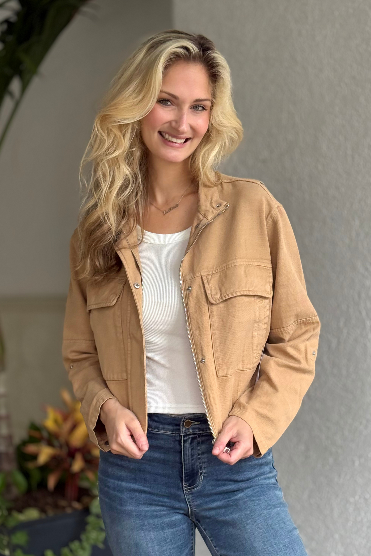 Close-up of Tribal Sandstone Twill Jacket showing mock neck and hidden zipper detail