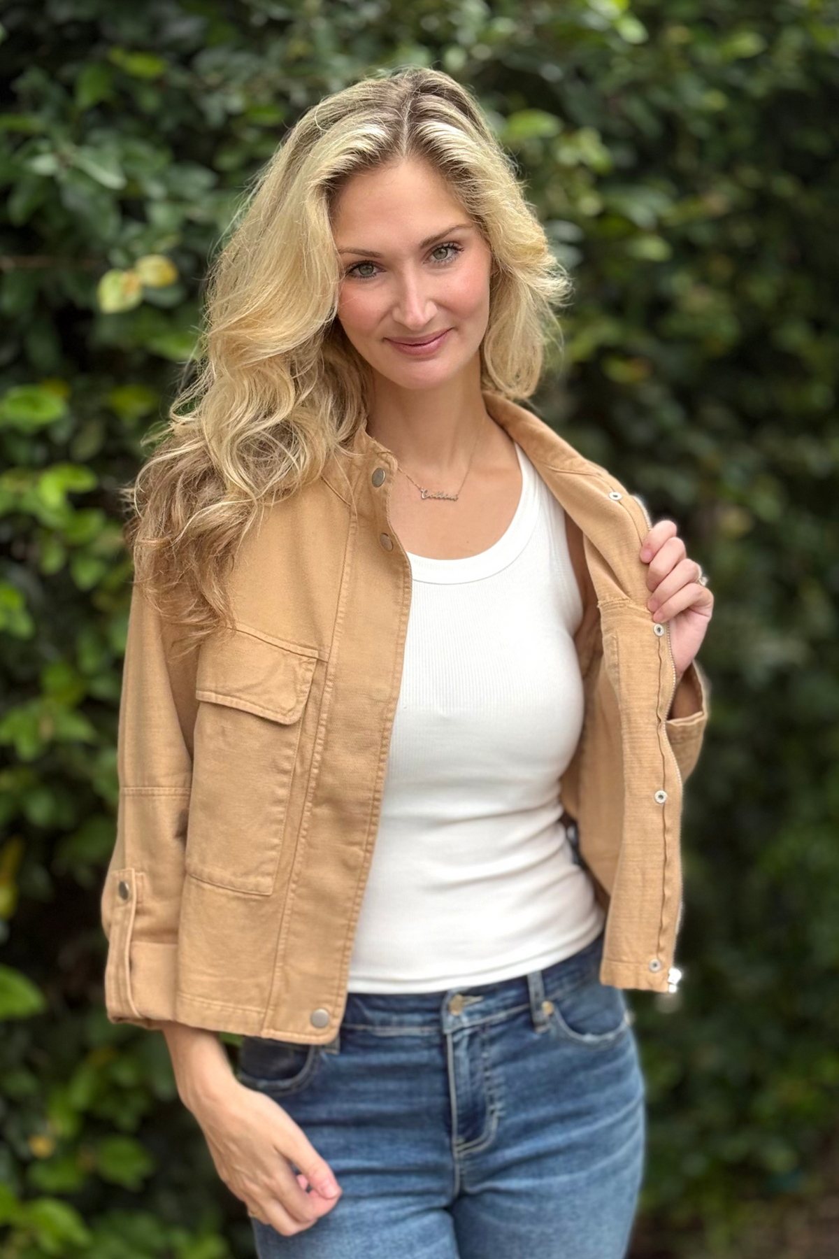 Woman wearing Tribal Sandstone Twill Zip-Front Jacket in Ice Latte with flap pockets