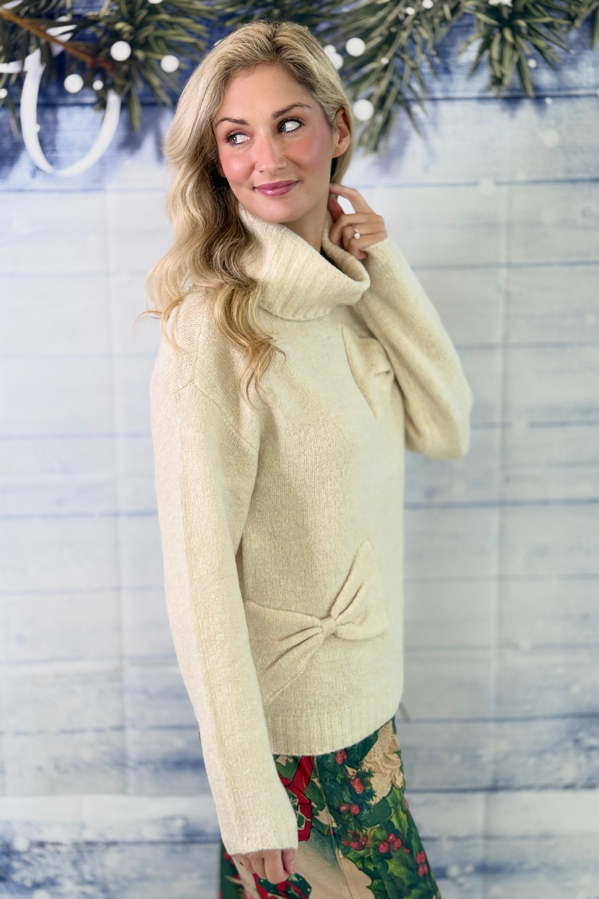 Women’s soft winter sweater with bow accents