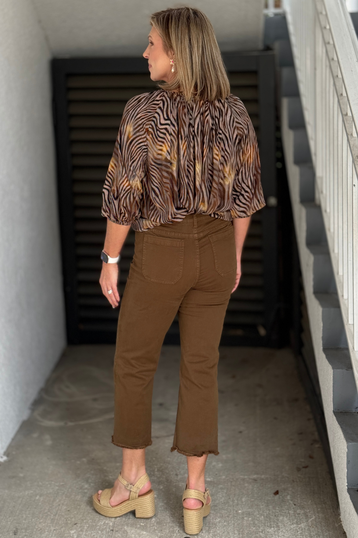 Dark olive cropped denim styled with an animal print blouse
