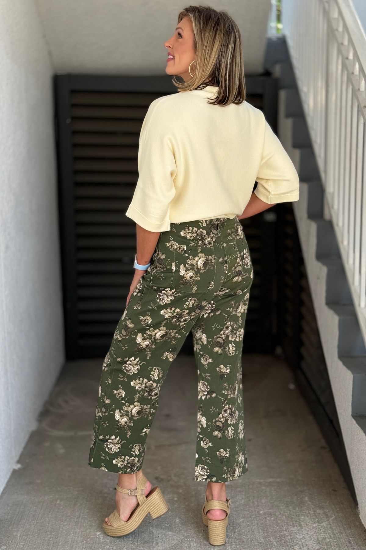 Olive botanical print pants with cream floral design