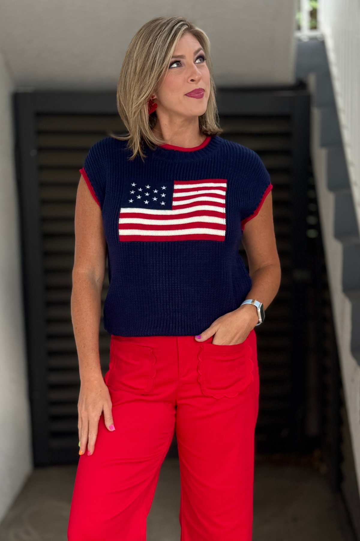 The Old Glory Sweater Vest with American flag graphic and red trim