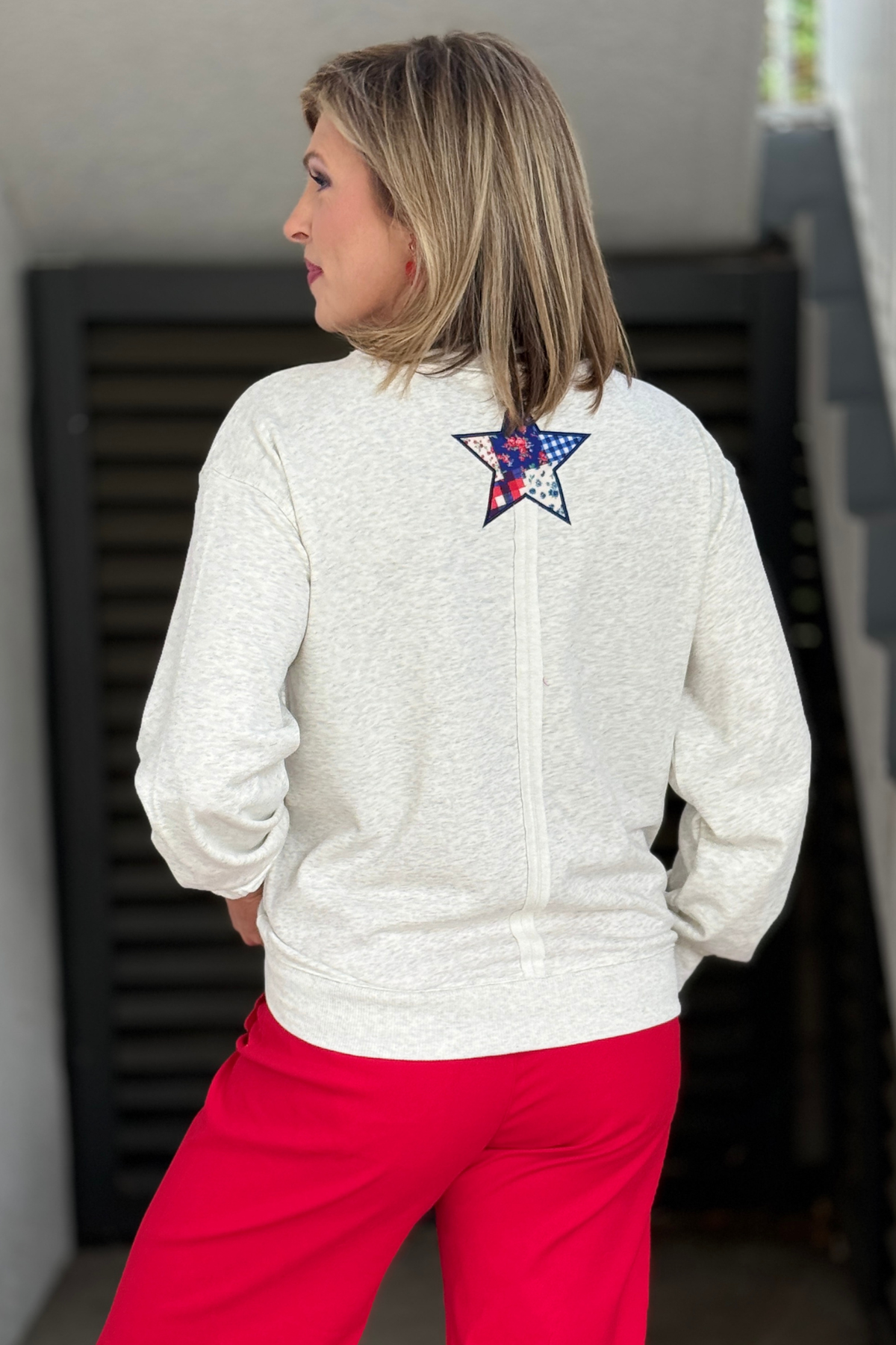 Casual Americana sweatshirt styled for summer celebrations