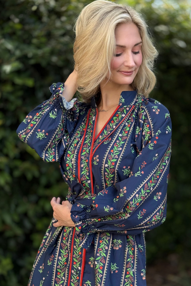 Navy floral print midi dress with long sleeves and ruffle neckline